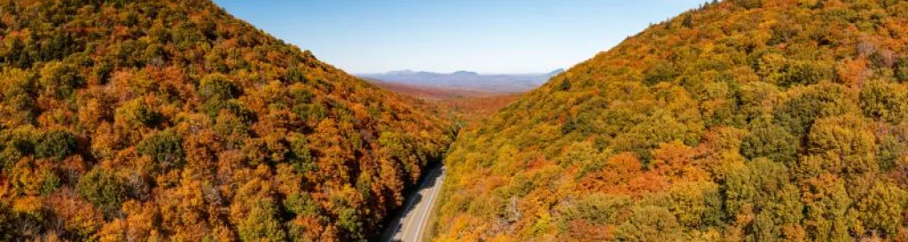 Aerial view of Jay Peak and trailhead on route 242 in Vermont during the fall